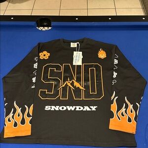 SNOWDAY hockey jersey Black with Orange Graphics comes brand new with tags